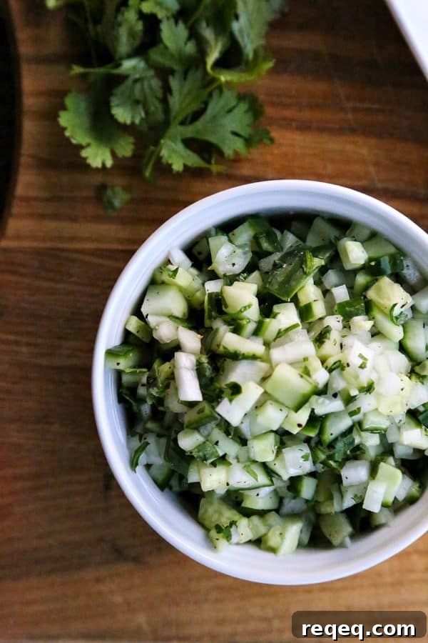 Cucumber and Sweet Onion Salsa Recipe — Fresh Summer Dip 3 Crunchy, refreshing, cooling Cucumber Sweet Onion Salsa from foodiewithfamily.com