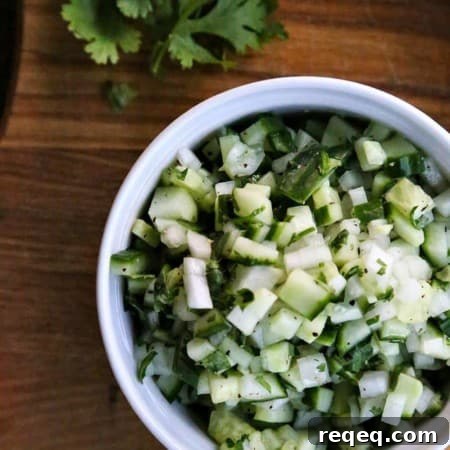 Crunchy, refreshing, cooling Cucumber Sweet Onion Salsa from foodiewithfamily.com
