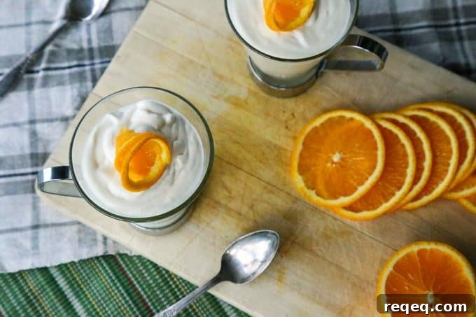 Silky Orange Mousse Recipe with Zesty Citrus Cream 3 Creamy Orange Mousse from foodiewithfamily.com #sponsored