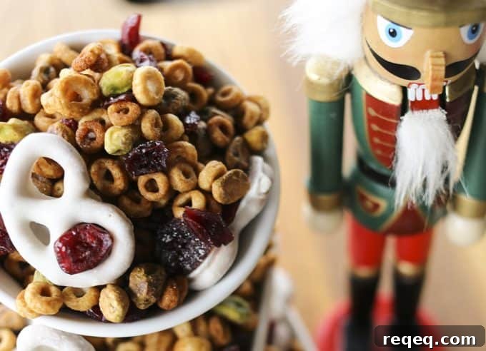 Cranberry Pistachio Holiday Snack Mix Recipe 2 This Cranberry Pistachio Snack Mix is designed to boost your energy without slowing you down. #sponsored