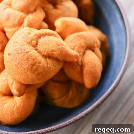 Buffalo Garlic Knot Recipe: Spicy, Cheesy Appetizer for Game Day 3 Buffalo Garlic Knots: tender, three bite sized spicy Buffalo Garlic Knots
