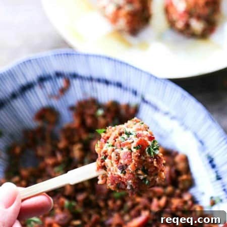 Chicken Bacon Ranch Cheese Ball Bites are the ultimate party food. Two-bite chicken and cheese balls completely crusted in crispy bacon and fresh parsley!