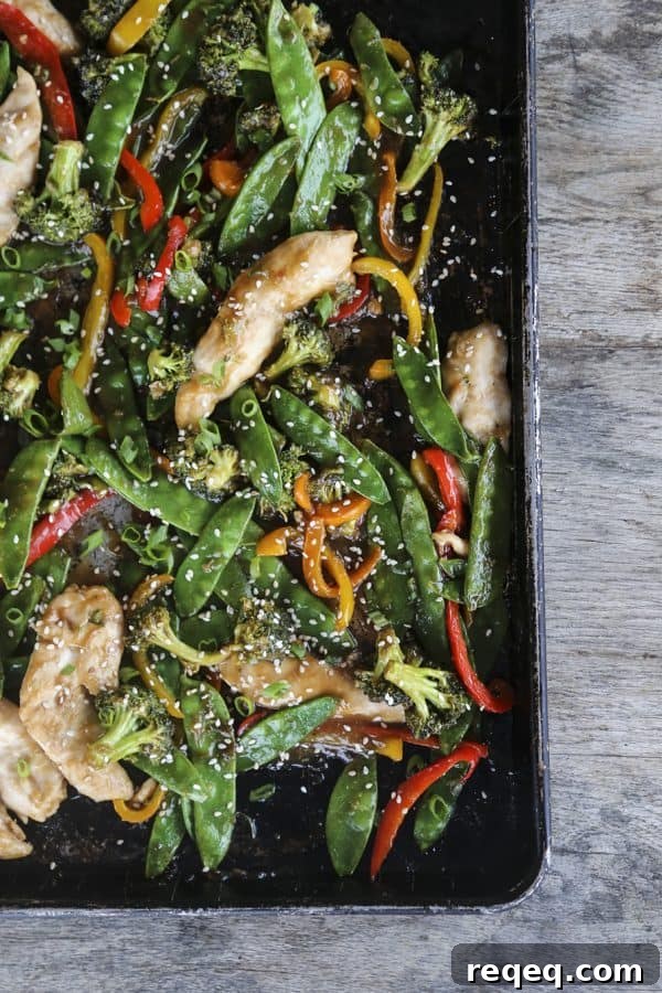 Sheet Pan Asian Chicken Stir-Fry with Veggies 2 Fabulously fast, filling, and flavourful, this Asian Chicken Stir Fry Sheet Pan Meal will please everyone and feed a crowd economically.