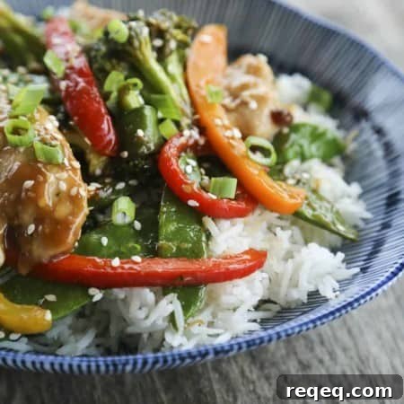 Fabulously fast, filling, and flavourful, this Asian Chicken Stir Fry Sheet Pan Meal will please everyone and feed a crowd economically.