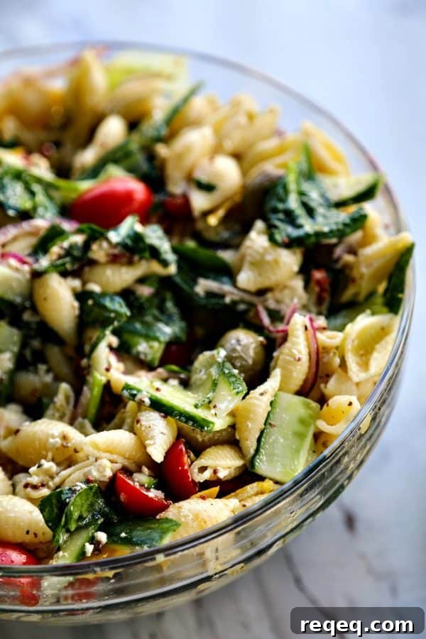 Greek Vegetable Pasta Salad for Veggie Lovers 3 Vegetable lovers rejoice! This Veggie Lover's Greek Pasta Salad is absolutely bursting with baby spinach, cucumbers, tomatoes, bell peppers, Greek olives, and red onions all in a tantalizing garlicky herbed lemon dressing.