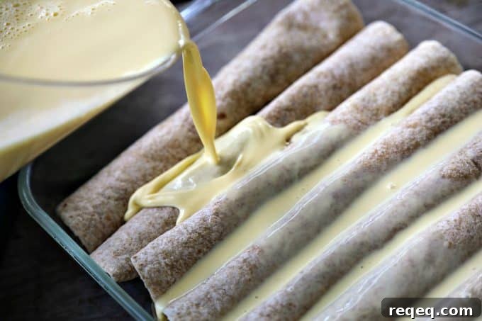 Overnight Breakfast Taco Enchiladas Recipe for Busy Mornings 4 Slices of Overnight Taco Breakfast Enchiladas served with toppings