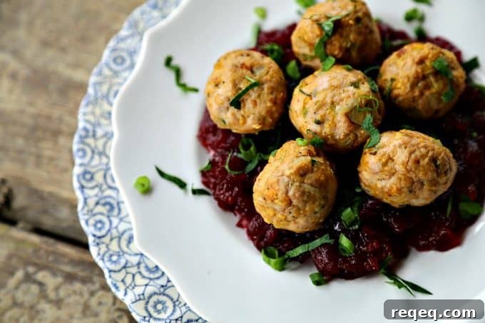 Turkey and stuffing meatballs made with cornbread stuffing mix, onions, celery, sage, and garlic softened in butter.