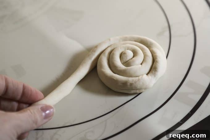 Making the very best soft pretzel rolls for sandwiches. soft pretzel roll dough, coil dough, silicone mat