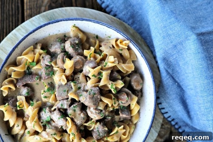 Instant Pot Garlic Beef Stroganoff Recipe 4 Instant Pot Garlic Beef Stroganoff: creamy, extra garlicky, mushroom and onion gravy enrobing tender beef cubes, with perfect pasta all cooked together in the Instant Pot. This has to be one of the most simple, crave-worthy comfort foods ever to be adapted to the world of electric pressure cookers.
