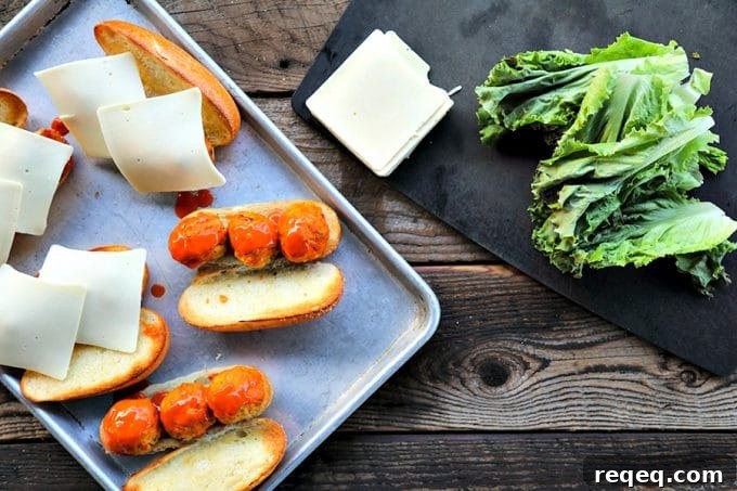 Close-up of buffalo chicken meatballs and melted cheese