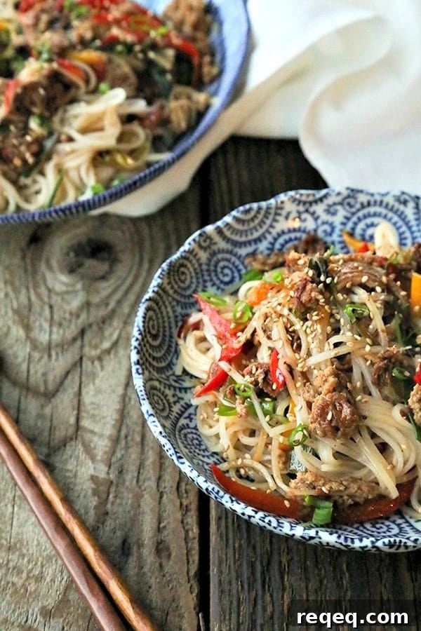 Crispy Pork Noodles with Garlic and Ginger Sauce 2 Easy Garlic Ginger Crispy Pork Noodles are going to be your new favourite dinner. Crazy simple. Crazier delicious. And easy on your pocketbook to boot. This delicious meal-in-one whips up in less than 30 minutes.