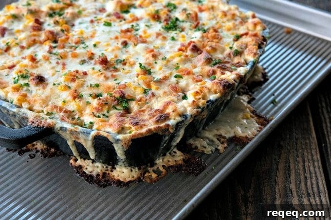 Creamy Baked Corn Dip with Cheesy Jalapeño Topping 2 Hot corn dip is chock full of sweet corn, tender chicken, crispy, smoky bacon, hatch chiles, and green onions in a bubbling, creamy, ranch cheese sauce.