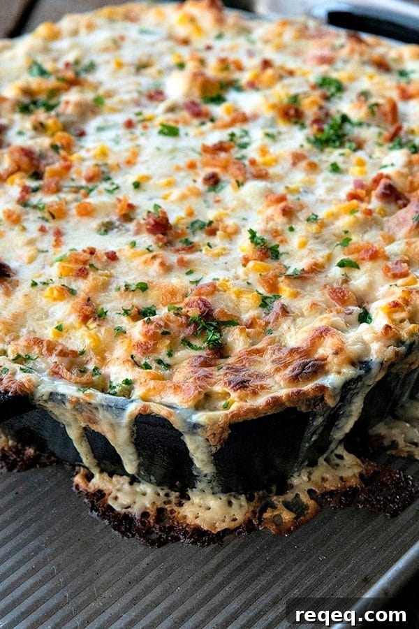 Creamy Baked Corn Dip with Cheesy Jalapeño Topping 3 Hot corn dip is chock full of sweet corn, tender chicken, crispy, smoky bacon, hatch chiles, and green onions in a bubbling, creamy, ranch cheese sauce.
