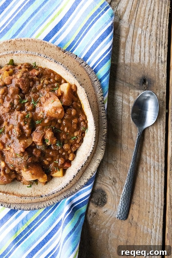 Smoky Chorizo Chili Recipe for Hearty Weeknight Dinners 2 Chorizo Chili is hearty, spicy, slow-simmered chorizo in smoky tomato sauce with tender potatoes, carrots, and lentils. This is serious comfort food!