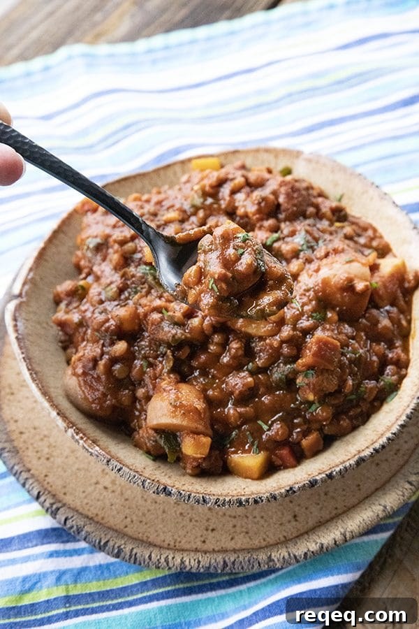 Smoky Chorizo Chili Recipe for Hearty Weeknight Dinners 3 Chorizo Chili is hearty, spicy, slow-simmered chorizo in smoky tomato sauce with tender potatoes, carrots, and lentils. This is serious comfort food!