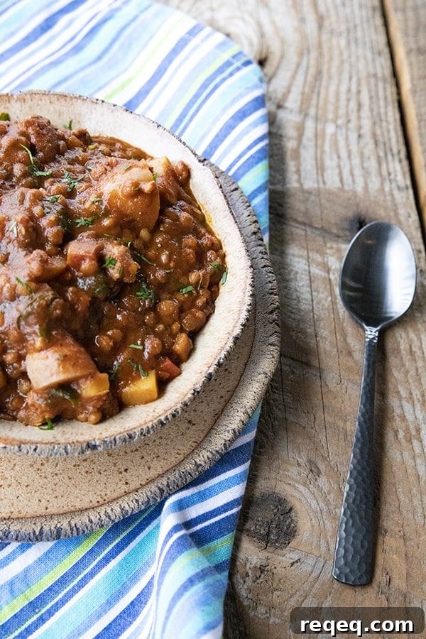 Smoky Chorizo Chili Recipe for Hearty Weeknight Dinners 4 Chorizo Chili is hearty, spicy, slow-simmered chorizo in smoky tomato sauce with tender potatoes, carrots, and lentils. This is serious comfort food!