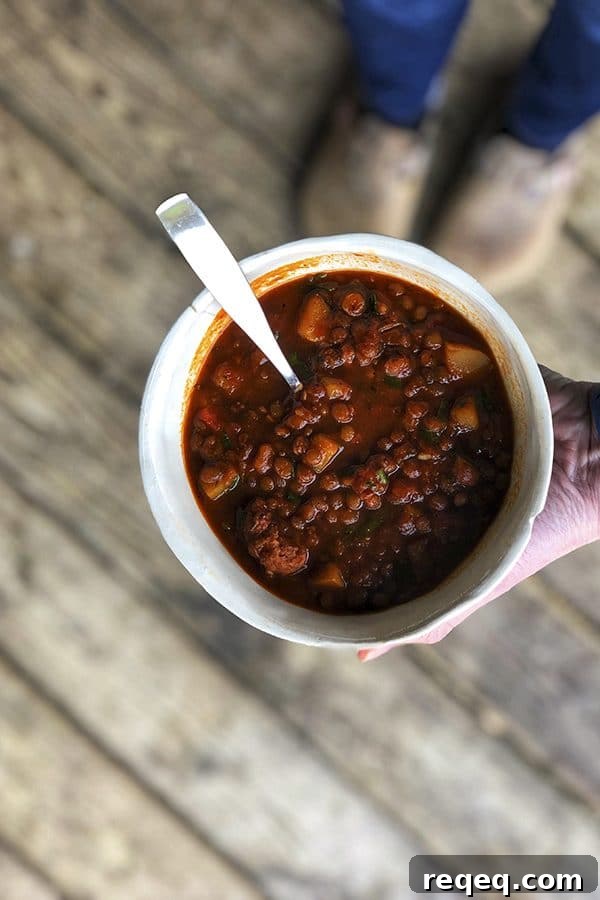 Smoky Chorizo Chili Recipe for Hearty Weeknight Dinners 5 Chorizo Chili is hearty, spicy, slow-simmered chorizo in smoky tomato sauce with tender potatoes, carrots, and lentils. This is serious comfort food!