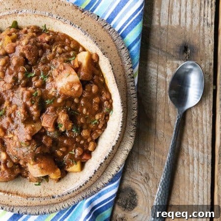 Smoky Chorizo Chili Recipe for Hearty Weeknight Dinners 8 Chorizo Chili is hearty, spicy, slow-simmered chorizo in smoky tomato sauce with tender potatoes, carrots, and lentils. This is serious comfort food!