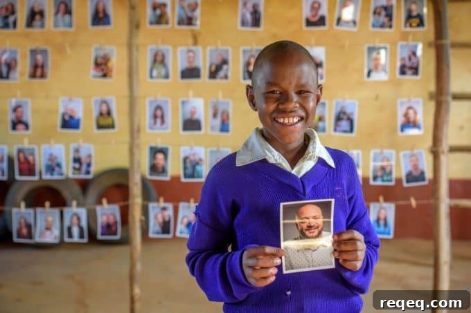 How World Vision Is Redefining Child Sponsorship (Chosen) 8 A Child looking at potential sponsors to choose through World Vision's Chosen program.