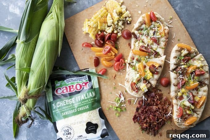 Crispy Grilled Flatbread Recipe for Charred, Fluffy Bread 5 ear of corn, cutting board, bacon, cheese, tomato topped flatbread