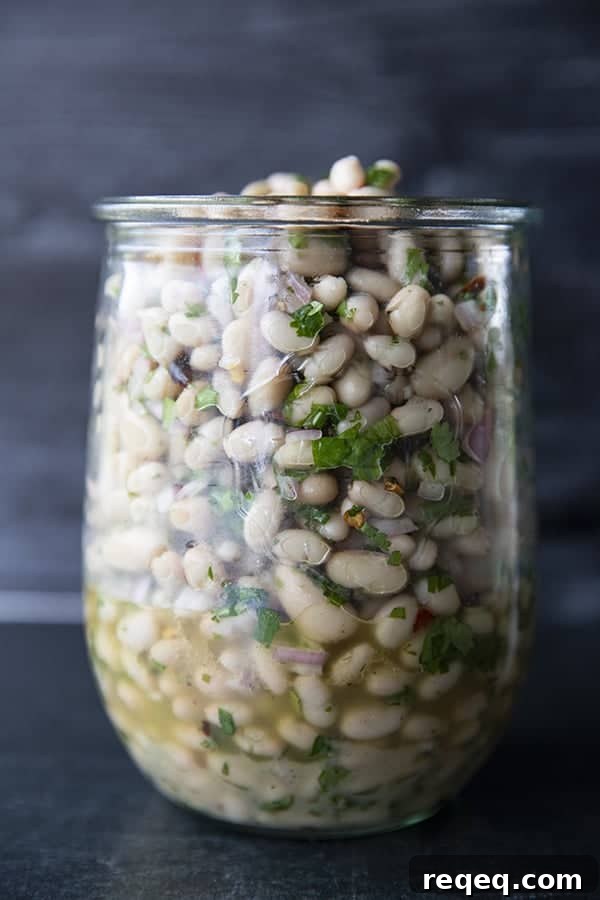Mediterranean White Bean Salad with Lemon and Herbs 3 Full of fresh herb flavors, White Bean Salad comes together in a breeze. Made with canned or home cooked white beans, abundant fresh herbs, and a simple vinaigrette dressing, this salad is delicious as a light lunch on its own or as a side dish with all your favorite entrees.