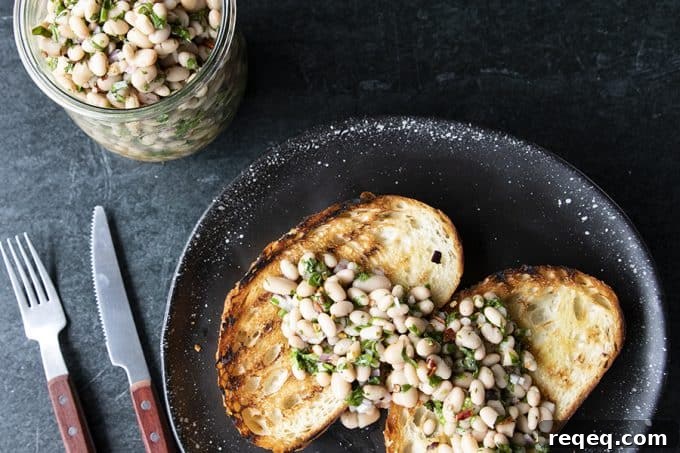 Mediterranean White Bean Salad with Lemon and Herbs 4 Full of fresh herb flavors, White Bean Salad comes together in a breeze. Made with canned or home cooked white beans, abundant fresh herbs, and a simple vinaigrette dressing, this salad is delicious as a light lunch on its own or as a side dish with all your favorite entrees.