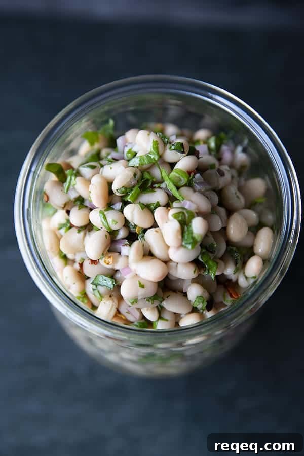 Mediterranean White Bean Salad with Lemon and Herbs 5 Full of fresh herb flavors, White Bean Salad comes together in a breeze. Made with canned or home cooked white beans, abundant fresh herbs, and a simple vinaigrette dressing, this salad is delicious as a light lunch on its own or as a side dish with all your favorite entrees.