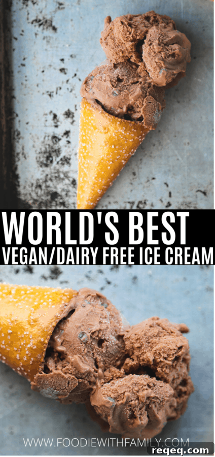 Two scoops of vegan dairy free chocolate ice cream in a pretzel cone on an antique sheet pan.
