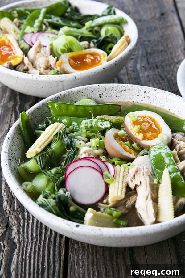 Instant Pot Chicken Ramen with jammy egg, baby corn, pea pods, bok choy, mushrooms, and radishes.