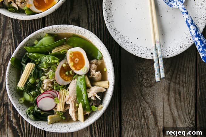 Instant Pot Chicken Ramen with jammy egg, baby corn, pea pods, bok choy, mushrooms, and radishes.