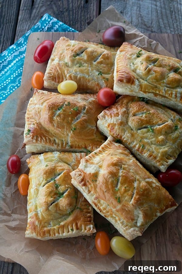 Cheesy Egg & Sausage Breakfast Pockets: Homemade Pastry Recipe 4 Breakfast Hot Pockets: puff pastry filled with cheesy scrambled eggs and sausage links.