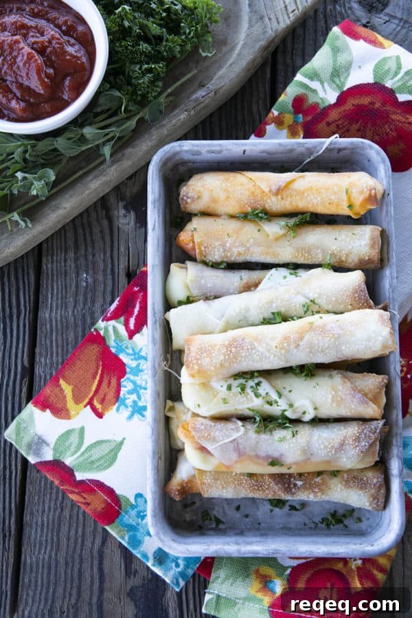 Buffalo Pizza Logs: Classic New York Snack Recipe 2 Pizza Logs are crispy, crunchy egg rolls filled with gooey, melted mozzarella cheese and garlicky pepperoni. Whether you whip these up in your air fryer, oven, or in a frying pan, you'll want these not just for game day, but all the time!