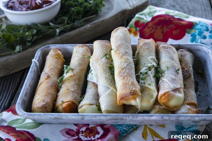 Buffalo Pizza Logs: Classic New York Snack Recipe 4 Pizza Logs are crispy, crunchy egg rolls filled with gooey, melted mozzarella cheese and garlicky pepperoni. Whether you whip these up in your air fryer, oven, or in a frying pan, you'll want these not just for game day, but all the time!