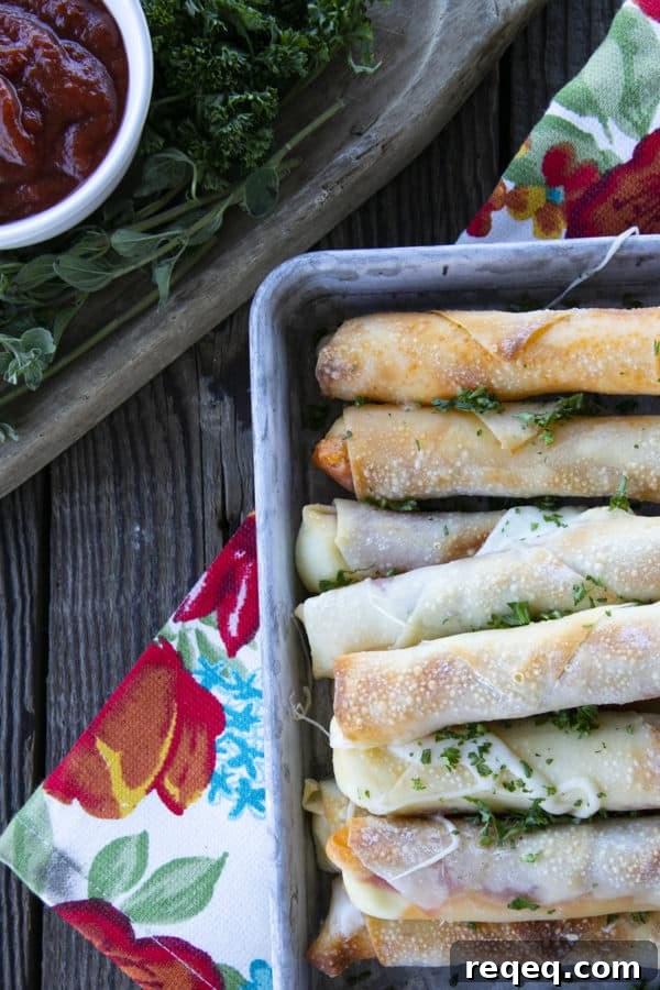 Buffalo Pizza Logs: Classic New York Snack Recipe 7 Pizza Logs are crispy, crunchy egg rolls filled with gooey, melted mozzarella cheese and garlicky pepperoni. Whether you whip these up in your air fryer, oven, or in a frying pan, you'll want these not just for game day, but all the time!