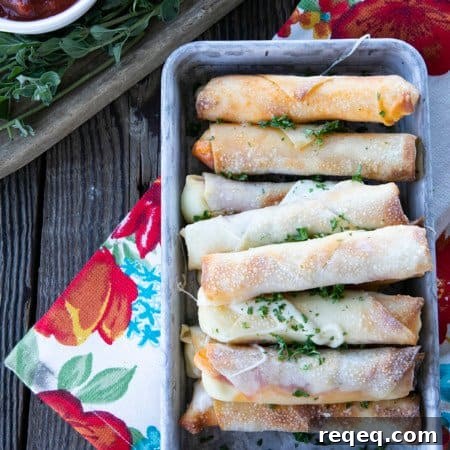 Buffalo Pizza Logs: Classic New York Snack Recipe 8 Pizza Logs are crispy, crunchy egg rolls filled with gooey, melted mozzarella cheese and garlicky pepperoni. Whether you whip these up in your air fryer, oven, or in a frying pan, you'll want these not just for game day, but all the time!