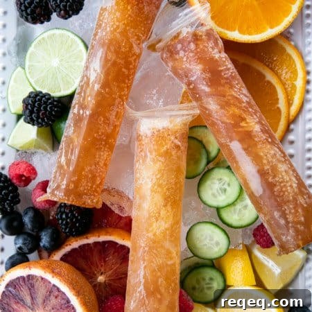 Pimm's Cup Boozy Popsicle Recipe for Grown-Up Summer Treats 6 Pimm's Cup Recipe boozy popsicles are made of a gin-based liqueur, fizzy Prosecco, a hint of lemon and strawberry puree, and are guaranteed to refresh you!