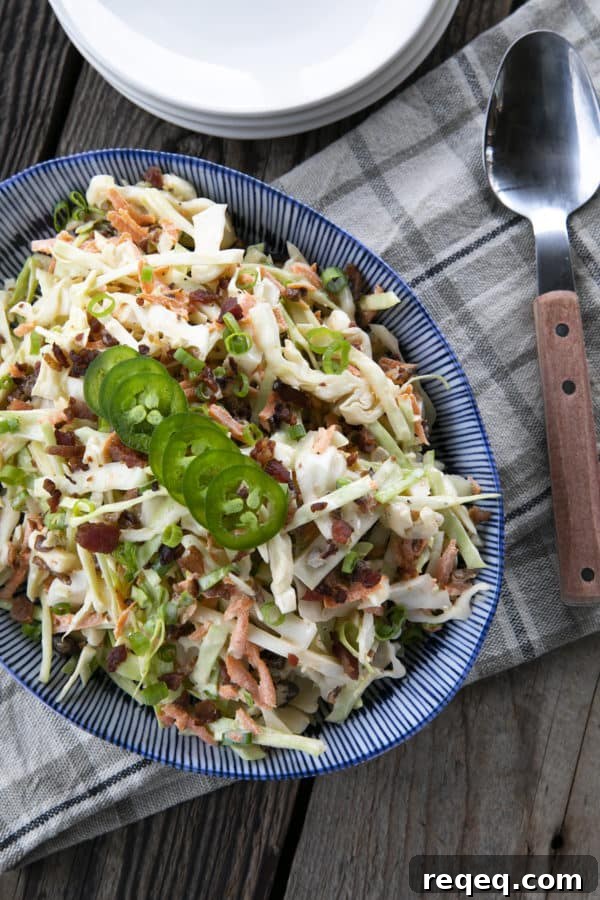 Jalapeno Coleslaw is a deliciously fresh, crunchy, savoury, summery salad to accompany all your grilled main dishes. Creamy, tangy, and easily adjustable to suit your heat-preferences, this super fresh spicy coleslaw is one you'll reach for again and again.