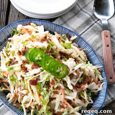 Jalapeno Coleslaw is a deliciously fresh, crunchy, savoury, summery salad to accompany all your grilled main dishes. Creamy, tangy, and easily adjustable to suit your heat-preferences, this super fresh spicy coleslaw is one you'll reach for again and again.