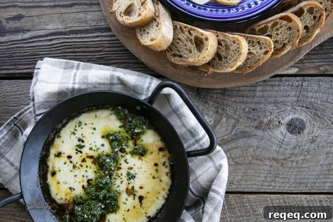 Provoleta - or Fried Cheese - pan-fried provolone with chimichurri and red pepper flakes