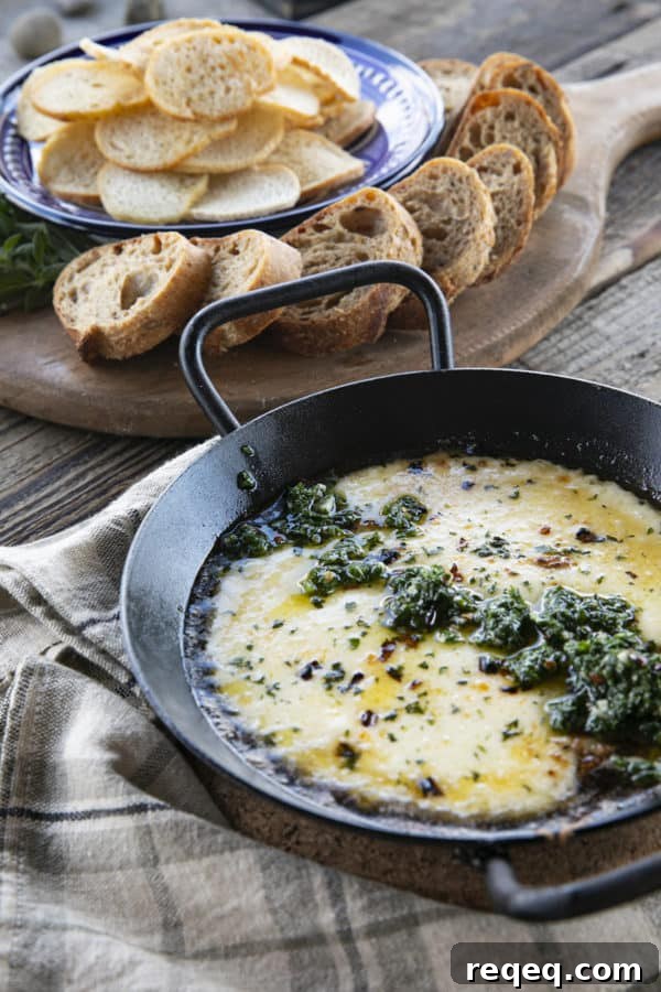 Provoleta - or Fried Cheese - pan-fried provolone with chimichurri and red pepper flakes