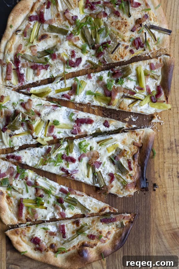Flammekueche, tarte Flambée, or flammkuchen is a fast and easy bacon and onion pizza type flatbread made with crème fraîche or sour cream. No yeast needed!