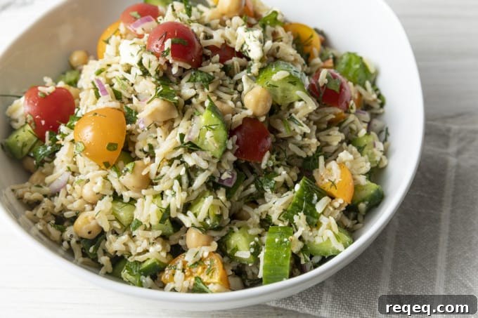 Ultimate Grain Salad Recipes for Flavorful Meal Prep 3 This delightful chilled Grain Salad is chock full of nutty brown rice, herbs, garbanzo beans, cucumbers, tomatoes, feta cheese, and red onions with a simple olive oil and lemon juice dressing. Make a batch of this to stash in the fridge and lunch is in the bag all week!
