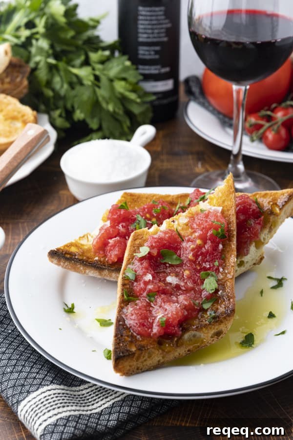 Spanish Tomato Toast: Classic Pan con Tomate Recipe for Brunch 2 Pan Con Tomate: toasted rustic bread rubbed with garlic, topped with fresh tomato pulp, extra virgin olive oil, and flaky sea salt.