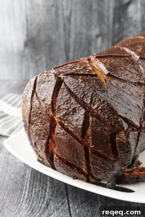 How to Smoke Bologna for Big Flavor at Home 6 crispy-edged bologna on a hamburger bun or great homemade sandwich bread with mustard or mayo, lettuce, tomato, and a slab of sweet onion.