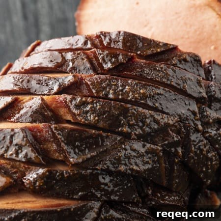 How to Smoke Bologna for Big Flavor at Home 9 crispy-edged bologna on a hamburger bun or great homemade sandwich bread with mustard or mayo, lettuce, tomato, and a slab of sweet onion.