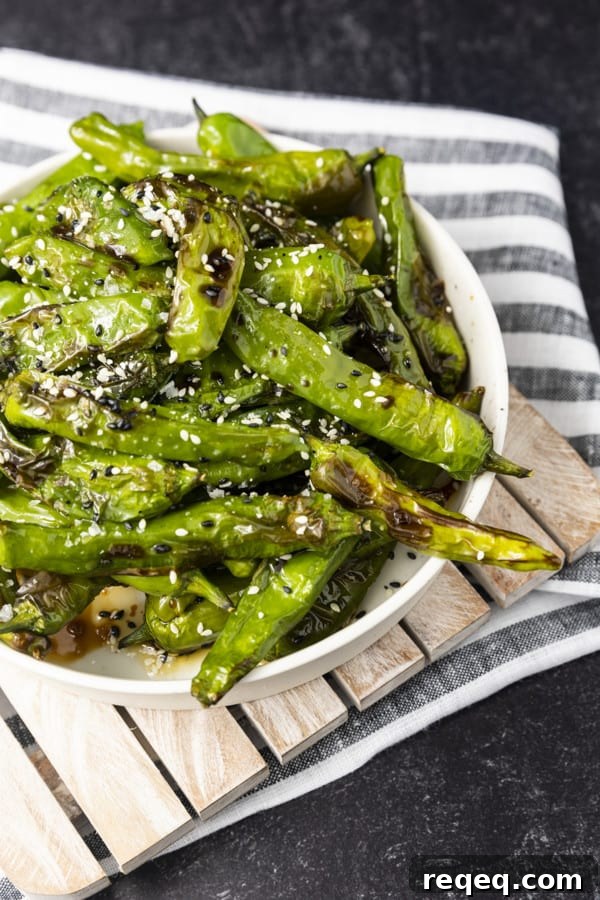 If you're looking for a great snack or the perfect appetizer, look no further than Shishito Peppers Air Fryer style. This super easy recipe for a tasty snack is made from simple ingredients and takes only 3 to 5 minutes of air frying.
