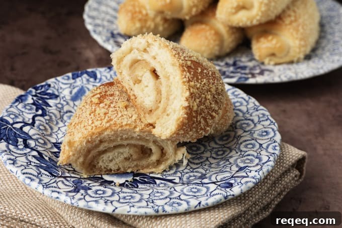 Senorita Bread: Sweet Filipino Ensaymada Recipe 4 Close-up of Senorita Bread showing the filling and crumb topping.