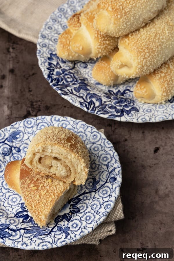 Senorita Bread: Sweet Filipino Ensaymada Recipe 6 Freshly baked Senorita Bread on a cooling rack.