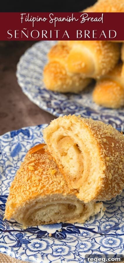 Senorita Bread: Sweet Filipino Ensaymada Recipe 7 A stack of Senorita Bread rolls, golden and ready to eat.