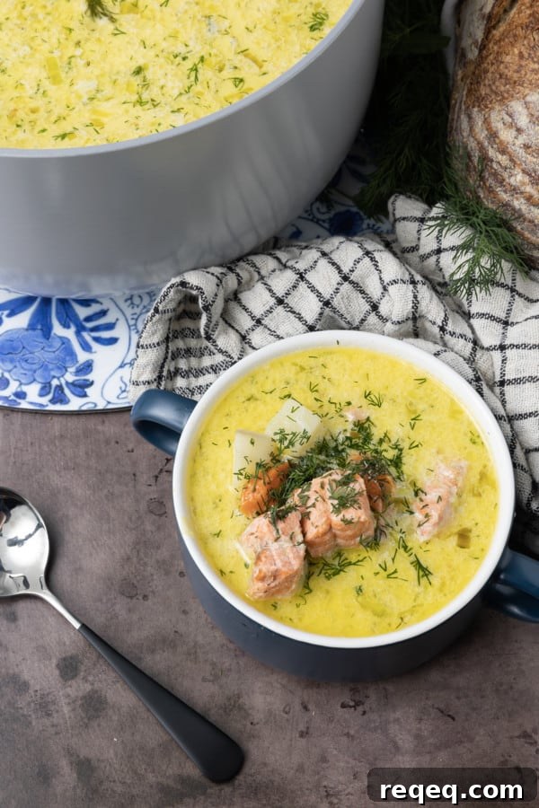 Creamy Scandinavian Salmon Soup Recipe with Dill and Potatoes 2 Salmon Soup is a light fish chowder in a creamy broth strewn with fresh dill that still manages to be substantial by virtue of hearty potatoes, carrots, leeks, and bite sized chunks of salmon. It's comforting enough to warm you from the inside out during cold winter days, but delicious and light enough to see you through last minute meals year round. Serve this salmon chowder recipe with crusty bread, butter, and a salad, you'll have a main meal that you turn to again and again on a cold winter's night. You'll instantly see and taste why this creamy Salmon Soup recipe is served throughout Finland and other Nordic countries.